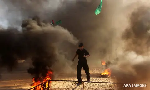 Palestinian youths demonstrate their skills during a military-style camp organized by the Hamas movement in Gaza City on July 28, 2015. Hamas's armed wing organized "Liberation Youths Camps" for young Palestinians aged b...