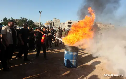 Palestinian youths demonstrate their skills during a military-style camp organized by the Hamas movement in Gaza City on July 28, 2015. Hamas's armed wing organized "Liberation Youths Camps" for young Palestinians aged b...