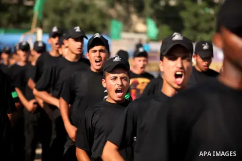 Palestinian youths demonstrate their skills during a military-style camp organized by the Hamas movement in Gaza City on July 28, 2015. Hamas's armed wing organized "Liberation Youths Camps" for young Palestinians aged b...