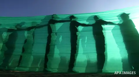 Palestinian youths demonstrate their skills during a military-style camp organized by the Hamas movement in Gaza City on July 28, 2015. Hamas's armed wing organized "Liberation Youths Camps" for young Palestinians aged b...