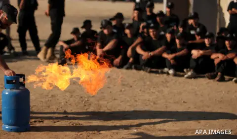 Palestinian youths demonstrate their skills during a military-style camp organized by the Hamas movement in Gaza City on July 28, 2015. Hamas's armed wing organized "Liberation Youths Camps" for young Palestinians aged b...