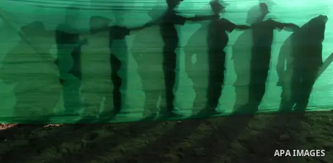 Palestinian youths demonstrate their skills during a military-style camp organized by the Hamas movement in Gaza City on July 28, 2015. Hamas's armed wing organized "Liberation Youths Camps" for young Palestinians aged b...