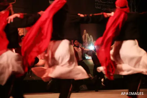 Palestinian from the Jouzour band for dabka perform during the Birzeit Nights Festival at Birzeit University in the West Bank city of Ramallah on July 28, 2015. Photo by Shadi Hatem