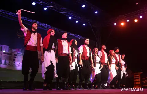 Palestinian from the Jouzour band for dabka perform during the Birzeit Nights Festival at Birzeit University in the West Bank city of Ramallah on July 28, 2015. Photo by Shadi Hatem