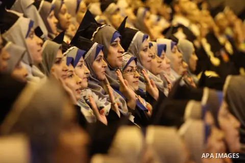 Palestinian students of the University collage of applied science, attend their graduation ceremony, in Gaza city on July 28, 2015. Photo by Mohammed Asad
