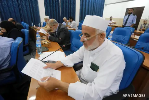 Members of the Palestinian legislative council from Hamas movement attend a meeting at the legislative council in Gaza city on July 29, 2015. Photo by Mohammed Asad