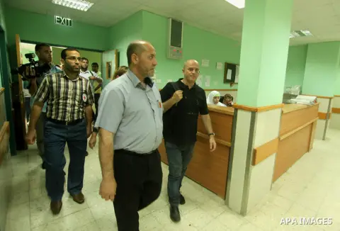 Head of the Red Cross mission in Israel and the Palestinian territories Jacques De Maio, visits the al-Aqsa Martyrs Hospital in Deir al-Balah in the northern Gaza Strip July 29, 2015. Photo by Ashraf Amra
