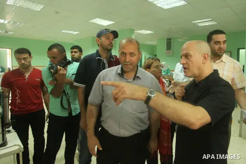 Head of the Red Cross mission in Israel and the Palestinian territories Jacques De Maio, visits the al-Aqsa Martyrs Hospital in Deir al-Balah in the northern Gaza Strip July 29, 2015. Photo by Ashraf Amra