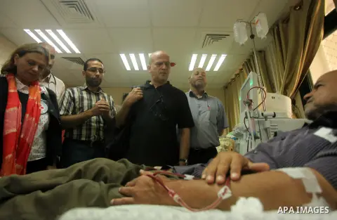 Head of the Red Cross mission in Israel and the Palestinian territories Jacques De Maio, visits the al-Aqsa Martyrs Hospital in Deir al-Balah in the northern Gaza Strip July 29, 2015. Photo by Ashraf Amra
