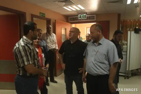 Head of the Red Cross mission in Israel and the Palestinian territories Jacques De Maio, visits the al-Aqsa Martyrs Hospital in Deir al-Balah in the northern Gaza Strip July 29, 2015. Photo by Ashraf Amra
