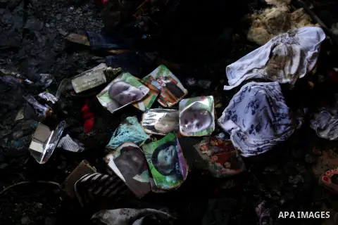 Pictures of a 18-months-old Palestinian boy and his family is seen burned at a house that was badly damaged from a suspected attack by Jewish extremists on two houses at Kafr Duma village near the West Bank city of Nablu...