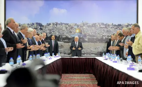 Palestinian President Mahmoud Abbas meets with the members of Palestinian leadership, at his headquarter in the West Bank city of Ramallah on July 31, 2015. Photo by Osama Falah