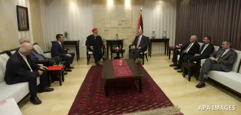 Palestinian Prime Minister Rami Hamdallah meet with Head of Samaritans priest largest Abdullah Wassef, in the West Bank city of Ramallah, on August 03, 2015. Photo by Prime Minister Office
