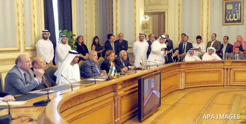 Egypt's Prime Minister Ibrahim Mahlab attends a signing ceremony with UAE minister of State Sultan Ahmed Al-Jaber, in Cairo on August 4, 2015. Mahlab, witnessed, today, the signings of delivery protocols for four of the...