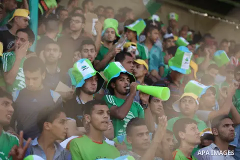 Fans attend the first leg match of the Palestine Cup final between Palestinian Gaza's Shejaya team and Hebron's Al-Ahly team at Yarmuk stadium in Gaza City, on August 6, 2015, as the two teams play each other for the fir...
