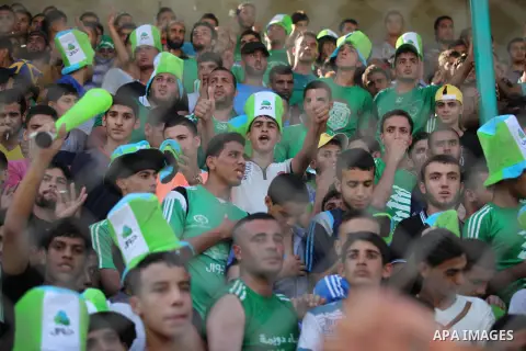 Fans attend the first leg match of the Palestine Cup final between Palestinian Gaza's Shejaya team and Hebron's Al-Ahly team at Yarmuk stadium in Gaza City, on August 6, 2015, as the two teams play each other for the fir...