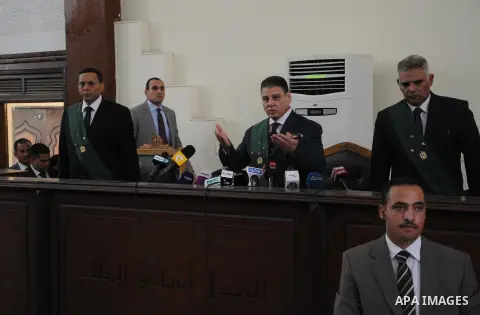 An Egyptian Judge attends the trial of Egyptian radical Islamist Mohammed al-Zawahiri, the brother of Al-Qaeda chief Ayman al-Zawahiri with 68 other defendants, at a court in Cairo on August 10, 2015. Photo by Amr Sayed