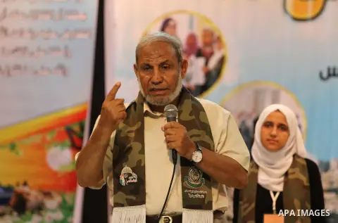 Senior Hamas leader Mahmoud al-Zahar speaks during a ceremony of a military-style camp organized by the Hamas movement, in Gaza city, on August 11, 2015. Photo by Mohammed Asad