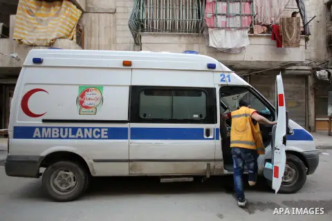 Nour, a 18-year-old Syrian man, rides an ambulance, in a rebel-controlled area of Aleppo, on August 13, 2015. Nour lost his leg following a bomb barrel attack by forces of Syria's President Bashar al-Assad near his house...