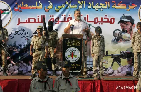 Senior Islamic Jihad leader Ahmad al-Modallal, speaks during a graduation ceremony of a military-style camp organized by his movement Khan Younis in the southern Gaza Strip, on August 18, 2015. Photo by Abed Rahim Khatib