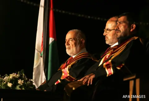 Deputy of the Legislative Council, Ahmed Bahar attends a graduation ceremony at Al-Aqsa University in Khan Younis in the southern of Gaza strip on August 29, 2015. Photo by Abed Rahim Khatib