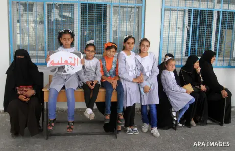 Palestinian pupils take part in a protest against the reduction of educational programs given by the United Nations Relief and Works Agency (UNRWA) and the growing number of students per class due to lack of funds in the...