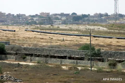 An Egyptian laborer works on the Egyptian side of the border with the southern Gaza Strip town of Rafah, Sep. 1, 2015. Egypt has renewed its military campaign by digging up tunnels along its border with the Gaza Strip fo...