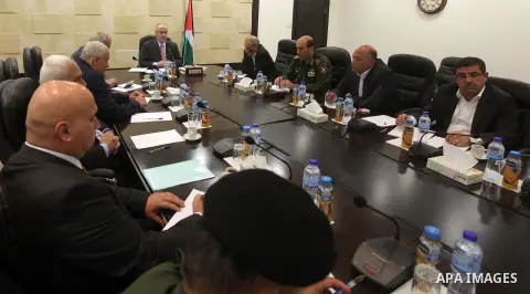 Palestinian Prime Minister Rami Hamdallah chairs a meeting with security chiefs, in the West Bank city of Ramallah on Sep. 2, 2015. Photo by Prime Minister Office