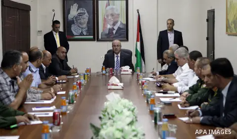 Palestinian Prime Minister Rami Hamdallah chairs a meeting with security chiefs, in the West Bank city of Nablus on Sep. 4, 2015. Photo by Prime Minister Office