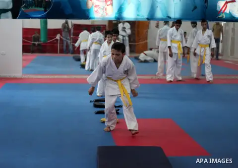 Blind and visually impaired Palestinian boys take part in a Karate class at al-Masthal club in Gaza city Sep. 06, 2015. The training is held twice a week by the club to lift the morale of the children, trainers said. Pho...