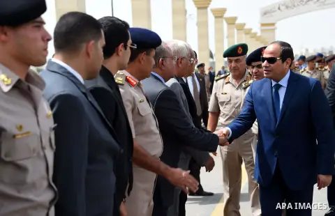 Egyptian President Abdel Fattah al-Sisi attends the funeral of Major General Amin Hussein in Cairo, Egypt on September 12, 2015. Photo by Egyptian President Office