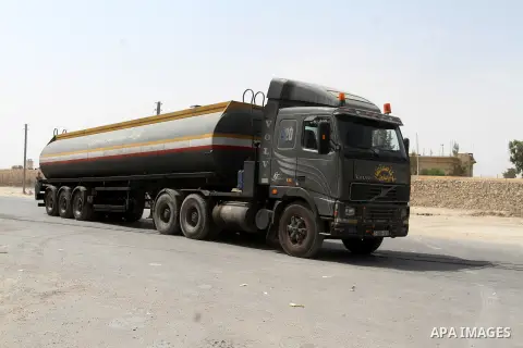A truck loaded with the fuel of the Gaza power station enters through the Kerem Shalom border crossing, in Rafah in the southern Gaza Strip on September 13, 2015. The Gaza station, which currently can supply Gazans with...