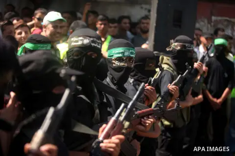 Palestinian Hamas militants take part in a protest against the Israeli police raid on Jerusalem's al-Aqsa mosque on Tuesday, in Khan Younis in the southern Gaza Strip, September 18, 2015. Israel deployed hundreds of extr...