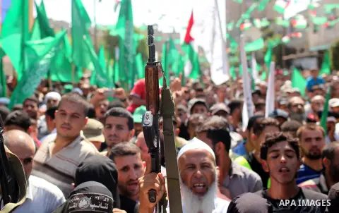 Palestinian Hamas supporters take part in a protest against the Israeli police raid on Jerusalem's al-Aqsa mosque on Tuesday, in Khan Younis in the southern Gaza Strip, September 18, 2015. Israel deployed hundreds of ext...