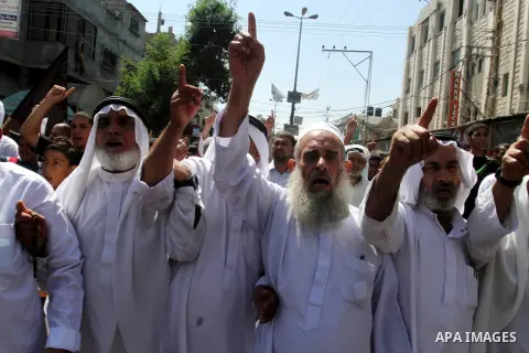 Palestinian Islamic Jihad supporters take part in a protest against the Israeli police raid on Jerusalem's al-Aqsa mosque on Tuesday, in Rafah in the southern Gaza Strip, September 18, 2015. Israel deployed hundreds of e...