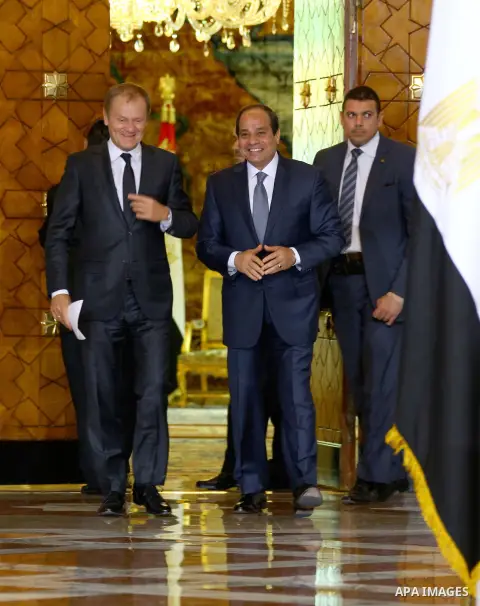 A handout picture made available by the Egyptian Presidency on September 19, 2015, shows Egyptian President Abdel Fattah al-Sisi walking alongside EU President Donald Tusk following a meeting in the capital Cairo. Photo...