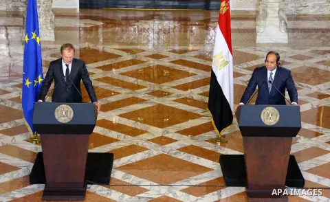 A handout picture made available by the Egyptian Presidency on September 19, 2015, shows Egyptian President Abdel Fattah al-Sisi listens to EU President Donald Tusk speak during a joint press conference in the capital Ca...