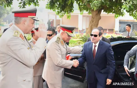 A handout picture released by the Egyptian Presidency shows Egyptian President Abdul Fattah al-Sisi after their visit to former Egyptian President Sadat's grave and the memorial of the Unknown Soldier tomb on October 4,...
