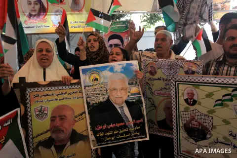 Relatives of Palestinian prisoners in Israeli jails, take part in a protest to show solidarity with Palestinians clashing with Israeli security forces at Jerusalem's al-Aqsa mosque, outside the Red Cross office, in Gaza...