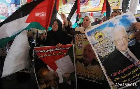 Relatives of Palestinian prisoners in Israeli jails, take part in a protest to show solidarity with Palestinians clashing with Israeli security forces at Jerusalem's al-Aqsa mosque, outside the Red Cross office, in Gaza...