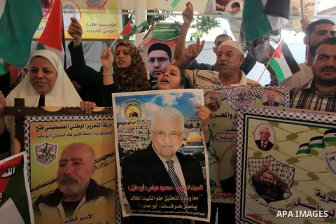 Relatives of Palestinian prisoners in Israeli jails, take part in a protest to show solidarity with Palestinians clashing with Israeli security forces at Jerusalem's al-Aqsa mosque, outside the Red Cross office, in Gaza...
