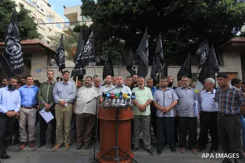 Relatives of Palestinian prisoners in Israeli jails, take part in a protest to show solidarity with Palestinians clashing with Israeli security forces at Jerusalem's al-Aqsa mosque, outside the Red Cross office, in Gaza...