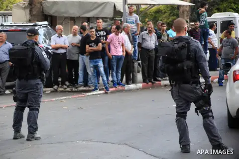 Israeli policemen secure the area where a Palestinian stabbed two Israeli Jews before he was shot dead outside Jerusalem's Old City October 10, 2015. Israeli forces shot dead two Palestinian assailants in East Jerusalem...