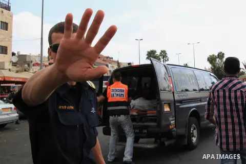 Israeli policemen secure the area where a Palestinian stabbed two Israeli Jews before he was shot dead outside Jerusalem's Old City October 10, 2015. Israeli forces shot dead two Palestinian assailants in East Jerusalem...