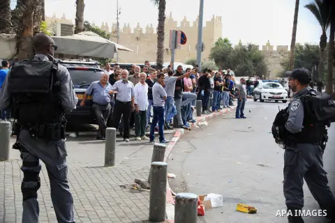 Israeli policemen secure the area where a Palestinian stabbed two Israeli Jews before he was shot dead outside Jerusalem's Old City October 10, 2015. Israeli forces shot dead two Palestinian assailants in East Jerusalem...