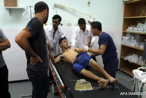 A wounded Palestinian protester recieves treatment at the European hospital following clashes with Israeli security forces near the border of Khan Yunis in the southern Gaza Strip October 10, 2015. Israeli security force...