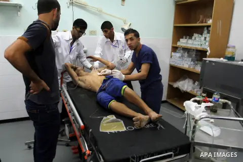 A wounded Palestinian protester recieves treatment at the European hospital following clashes with Israeli security forces near the border of Khan Yunis in the southern Gaza Strip October 10, 2015. Israeli security force...