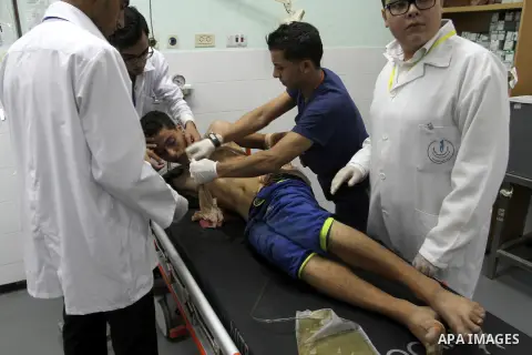 A wounded Palestinian protester recieves treatment at the European hospital following clashes with Israeli security forces near the border of Khan Yunis in the southern Gaza Strip October 10, 2015. Israeli security force...