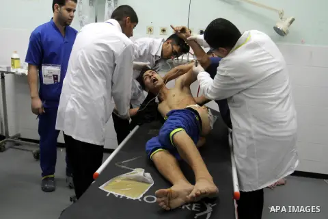 A wounded Palestinian protester recieves treatment at the European hospital following clashes with Israeli security forces near the border of Khan Yunis in the southern Gaza Strip October 10, 2015. Israeli security force...