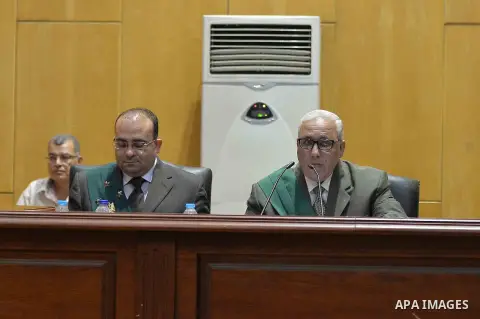 The Judges attend the trial of Egyptian defendants over a 2012 stadium riot in the canal city of Port Said at the police academy on the outskirts of the capital Cairo on Oct. 12, 2015. Seven defendants wait for the verdi...